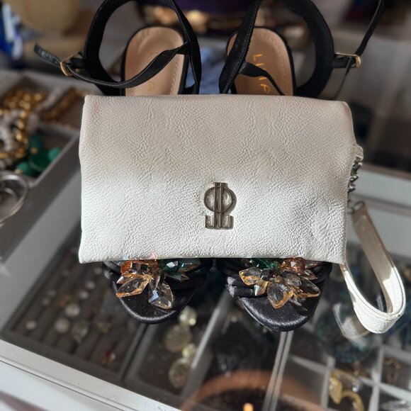 Jennifer Lopez Cream/White Magnetic Flap Wristlet - Picture 1 of 4